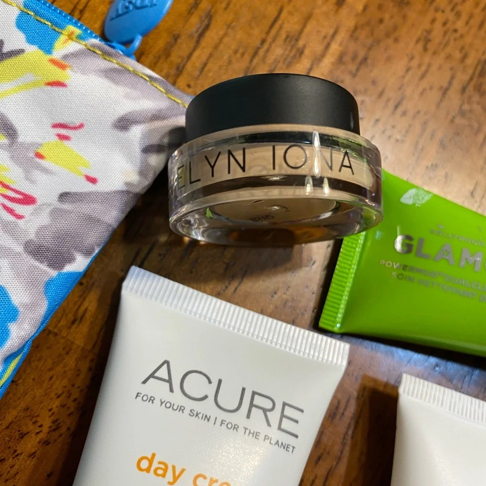 Ipsy makeup bags (3) with 14 different products. New, never opened.